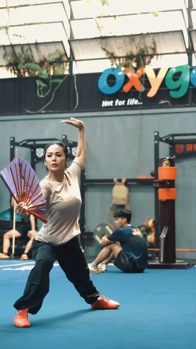 Kris Dayanti olahraga wushu