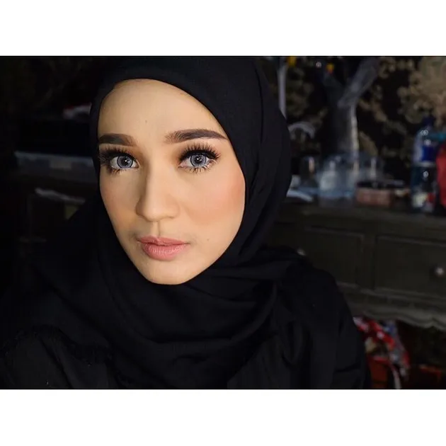 Dhini Aminarti