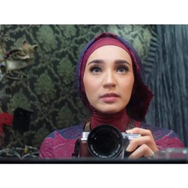 Dhini Aminarti