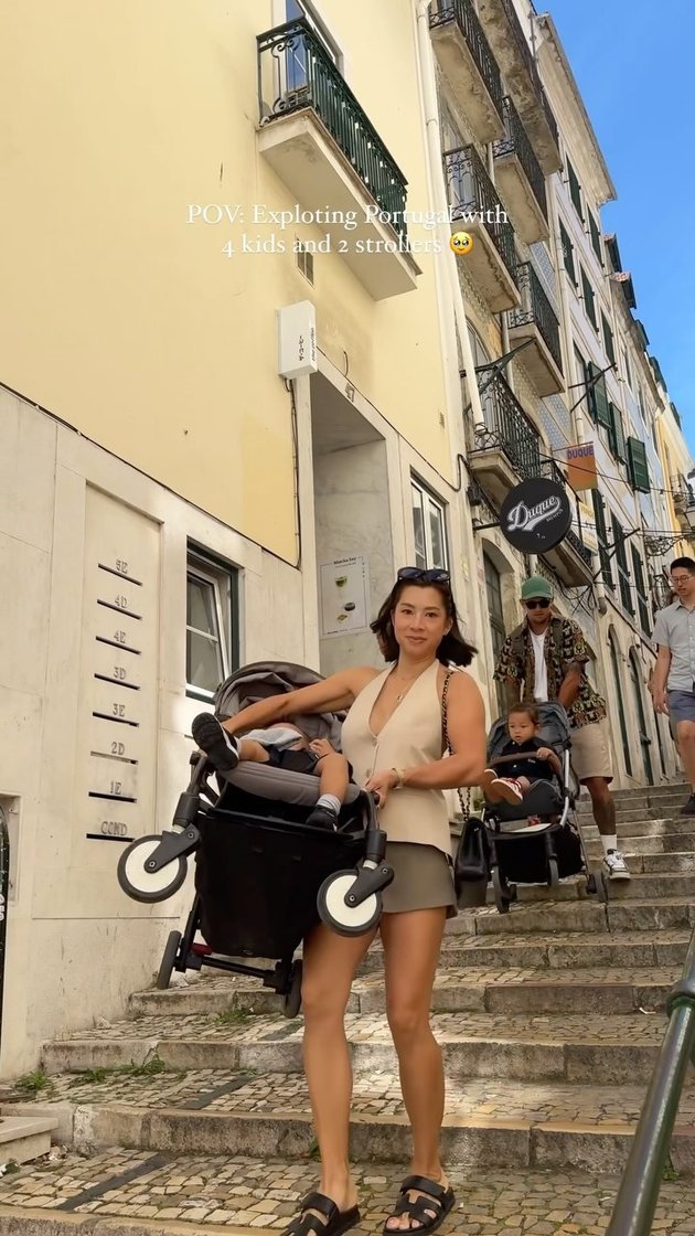 Holiday to Portugal, Jennifer Bachdim's Portrait Willing to Lift and Push Strollers for the Sake of Her Children's Happiness