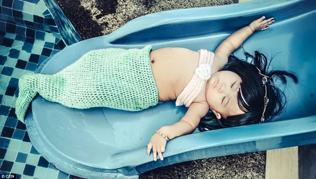 Le Pham Kha Di - bayi ikan duyung gemuk