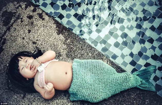 Le Pham Kha Di - bayi ikan duyung gemuk