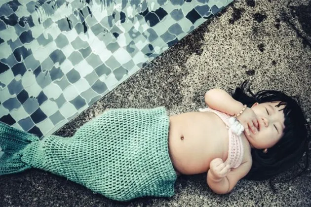 Le Pham Kha Di - bayi ikan duyung gemuk