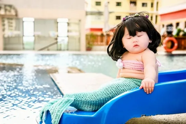 Le Pham Kha Di - bayi ikan duyung gemuk