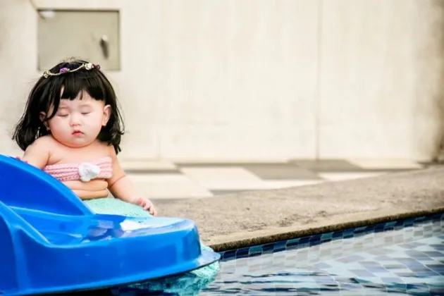 Le Pham Kha Di - bayi ikan duyung gemuk