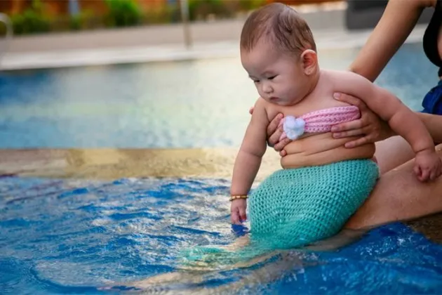 Le Pham Kha Di - bayi ikan duyung gemuk