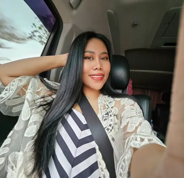 Evi Masamba Bersama Buah Hati