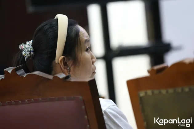 Melani Mecimapro sidang