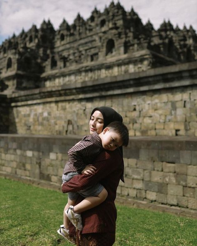 Portrait of Baby Athar, Child of Citra Kirana and Rezky Aditya at Borobudur Temple, Making Cute Faces Because of Exhaustion