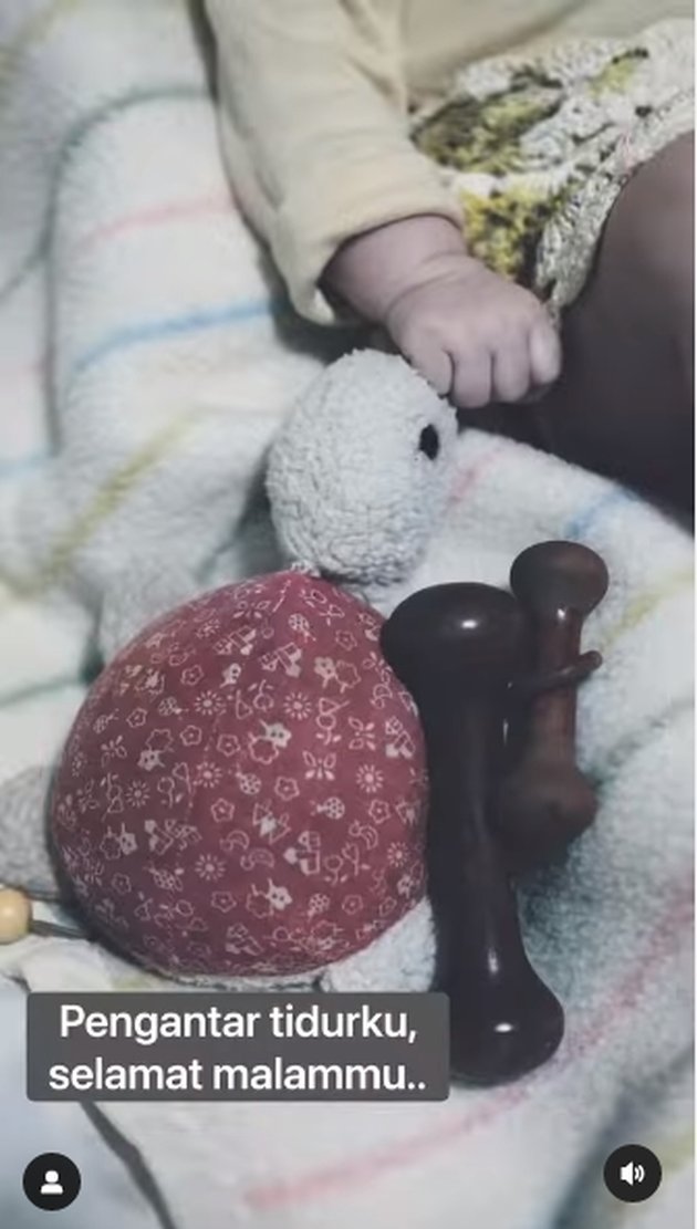 Snapshot of Baby Djiwa at 3 Months Old, Wearing Shoes and Playing with Nadine Chandrawinata's Used Toys - So Adorable