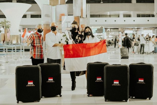 Portrait of Jihane Almira Representing Indonesia at Miss Supranational 2021, Raising the Indonesian Flag at the Airport