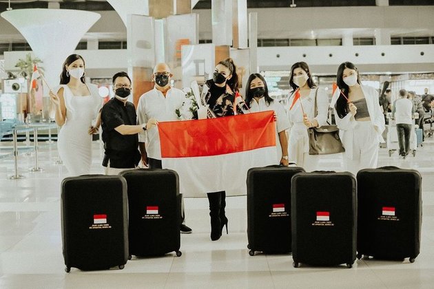 Portrait of Jihane Almira Representing Indonesia at Miss Supranational 2021, Raising the Indonesian Flag at the Airport