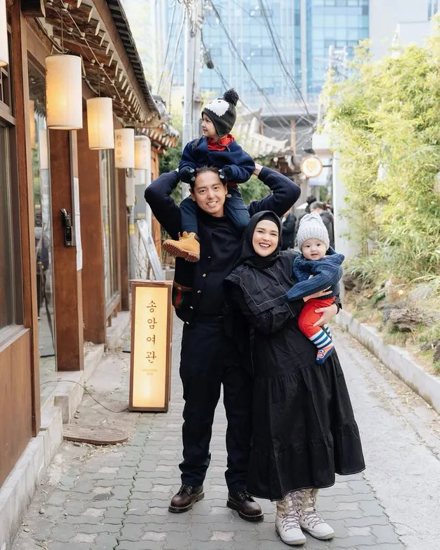 Romantic Holiday Portraits of Cut Meyriska and Roger Danuarta in South Korea, Dancing Sweetly Under the Snow