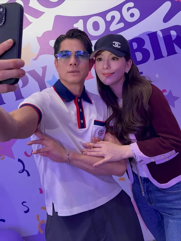 Aaron Kwok dan istri