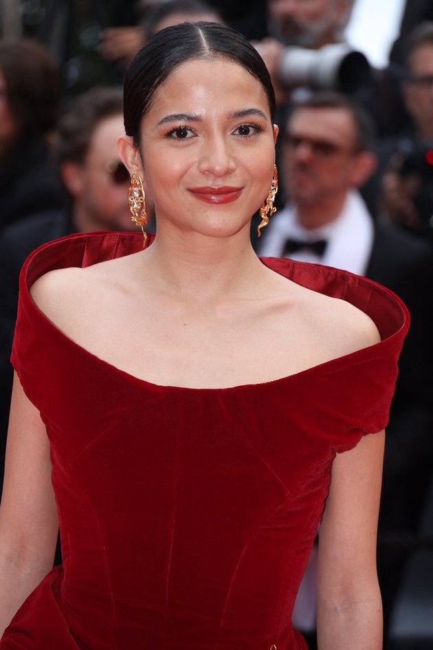 Portrait of Putri Marino on the Red Carpet at the Cannes Film Festival 2024, Stunning in a Red Dress