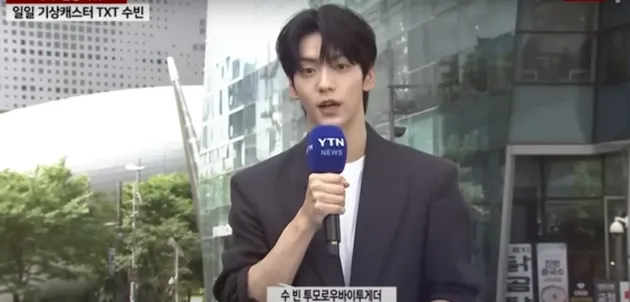 Potret Soobin TXT Jadi Reporter Peramal Cuaca
