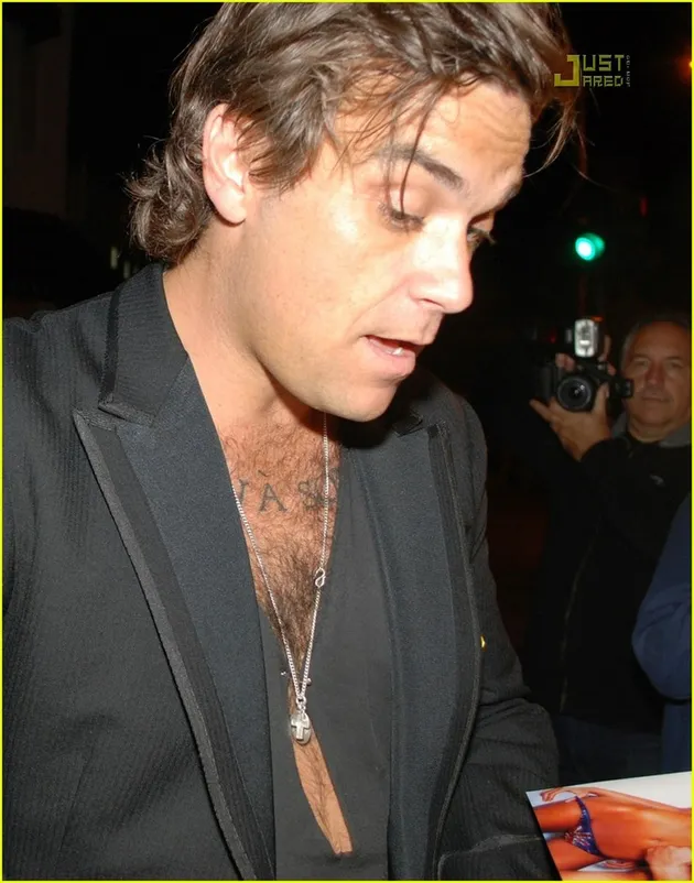robbie williams pamer bulu dada