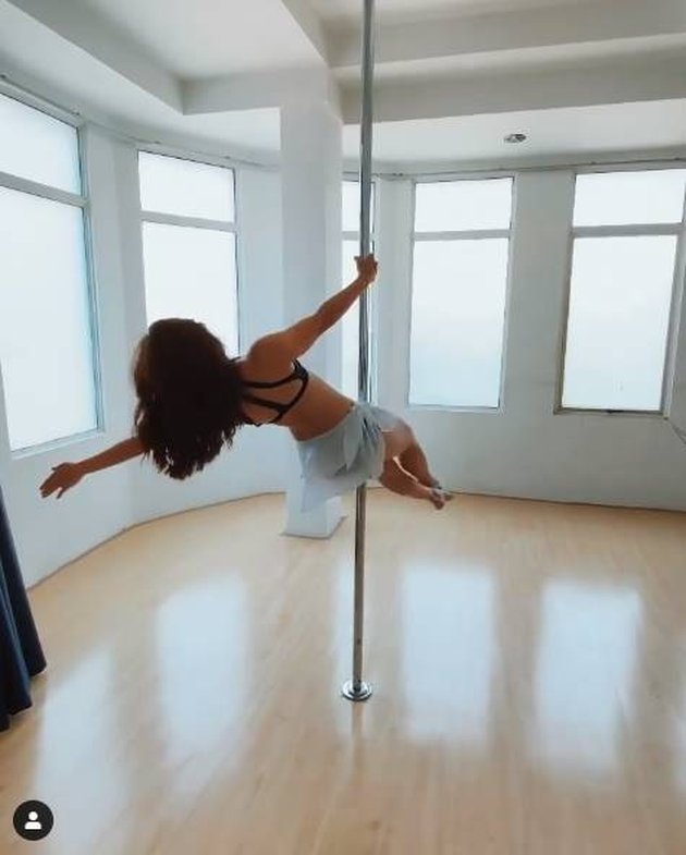 Nikita Willy's Enchanting Charm Doing Pole Dance, Attracting Attention in a Mini Dress