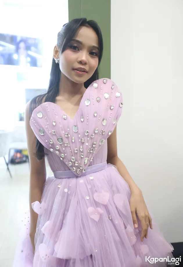 Syaqirah dengan dress ungu