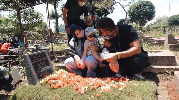 Not Much Fuss, Here are 9 Photos of Ammar Zoni and Irish Bella Taking Baby Air to Visit the Graves of Their Twin Children