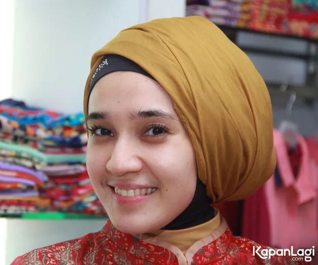 Dhini Aminarti
