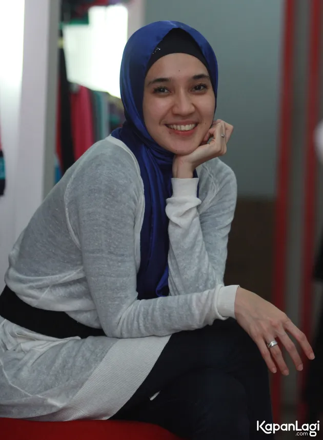 Dhini Aminarti