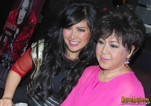 Titi DJ, Diana Nasution