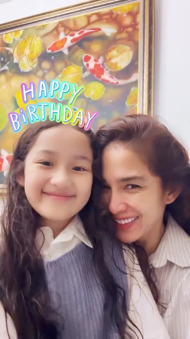 Ussy Sulistiawaty bersama anak keempatnya, Sheva