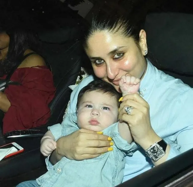 Saif yang meminta Kareena mengajari Taimur melambaikan tangan pada paparazzi ©instagram