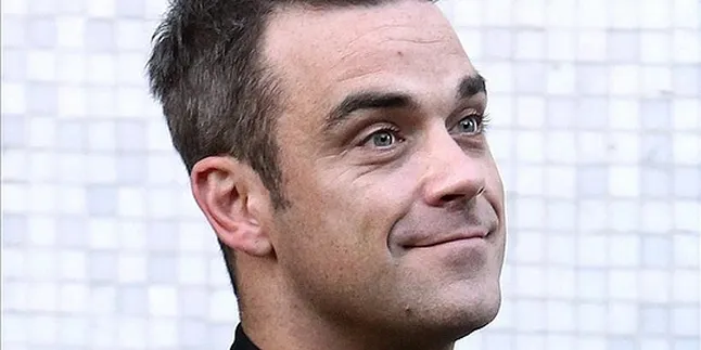 Robbie Williams Calon Pengganti Simon Cowell