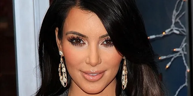 Kim Kardashian Bakal Jadi Pendamping John Travolta
