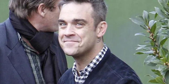 Keracunan Makanan, Robbie Williams Dapat Bonus