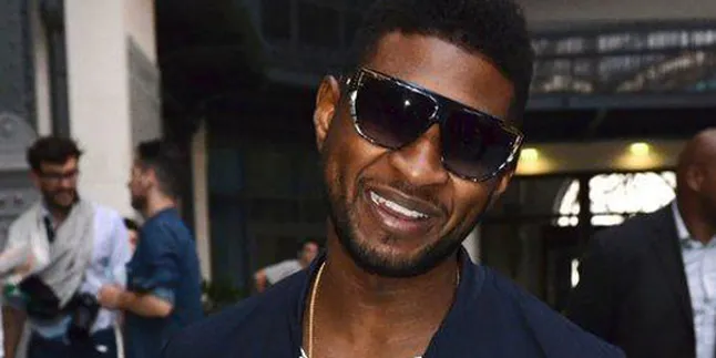 Ups, Celana Usher Robek di Depan Bill Clinton!