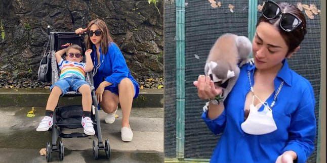 12 Photos of Selvi Kitty's Vacation in Bali, Playing with Birds with Her Child - Feeding Wild Animals