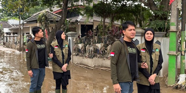 6 Portraits of Dhini Aminarti and Dimas Seto as Flood Volunteers in Villa Nusa Indah