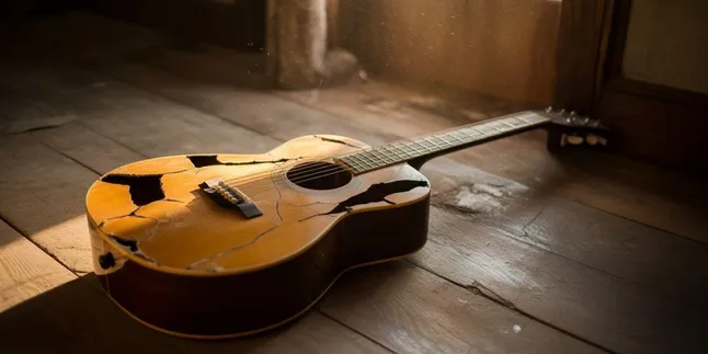 Arti Mimpi Gitar Patah: Makna dan Tafsir Lengkap
