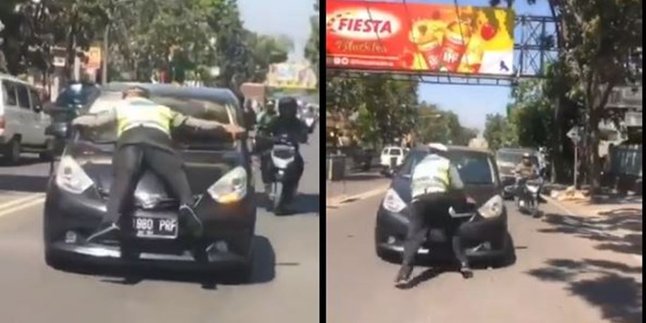 Bak Film Hollywood, Polisi Ini Naik Kap Mobil Demi Hentikan Pelanggar Lalu Lintas