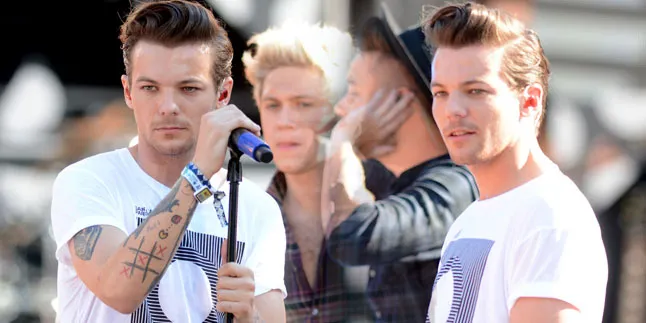 Baru Berusia 6 Hari, Louis Tomlinson Ajak Anak Jalan-Jalan