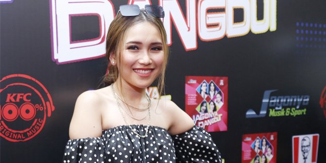 Playing Football with Village Residents Becomes Ayu Ting Ting's Way to Welcome the New Year 2020