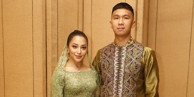 Accompanied by Indra Priawan, Nikita Willy Looks Stunning Attending Arya Bakrie and Vannya Istarinda's Wedding