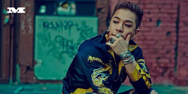 [FOTO] Tiba di Jakarta, Taeyang Big Bang Sembunyikan Wajahnya