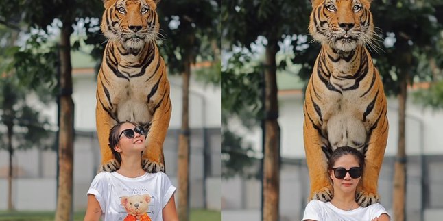 Abigail Gusmawan's Relaxed Style While Taking a Photo with a Tiger in Thailand