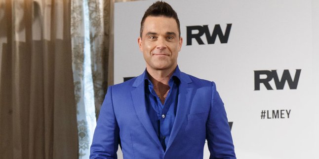 Ingin Comeback, Robbie Williams Memohon Lagu Hits Pada Ed Sheeran