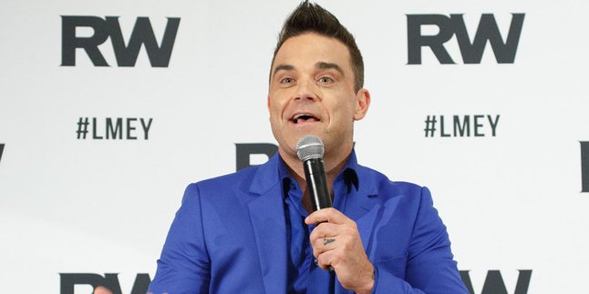 Inikah Tanggapan Robbie Williams Soal Kejadian Hand Sanitizer?