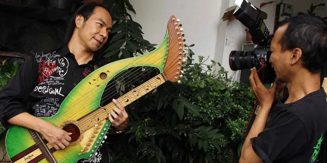 Iwan Hasan Dipercaya Mengaransemen Lagu SBY Karena Prestasi