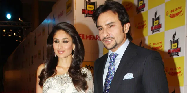 Jadi Tuan Rumah Pesta, Kareena Cium Mesra Suami di Hadapan Tamu