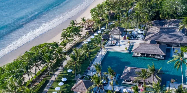 Kenangan Manis Akhir Tahun Liburan di Pantai Jimbaran yang Tak Terlupakan