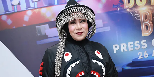 Lagu Pernikahan Bella - Emran Sudah Disiapkan Melly Goeslaw