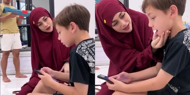 The Beautiful Portrait of Celine Evangelista in a Red Hijab, Lucio's Handsomeness Also Draws Attention