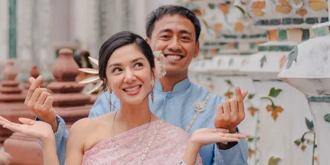 Portrait of Fanny Ghassani and Husband at a Wedding, Wearing Traditional Thai Attire